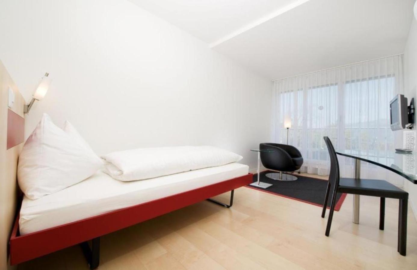 Hotel Seaside Spiez Bilik gambar